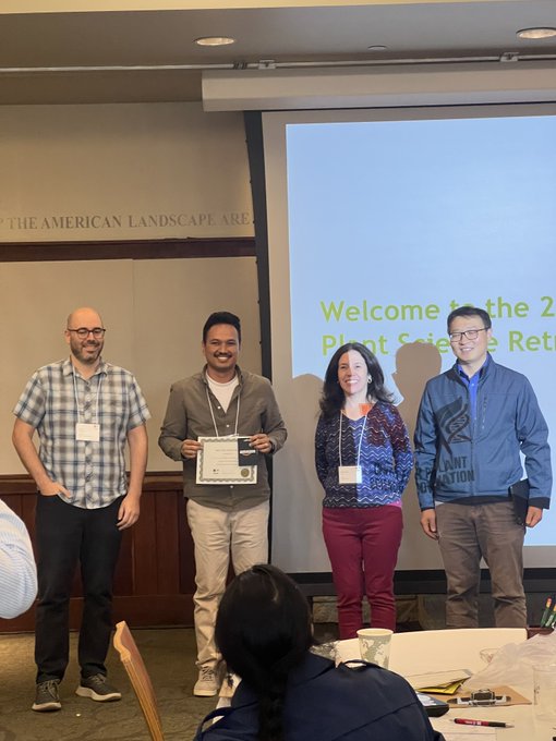 Kumar Shrestha getting an award at the 2024 PSI Retreat